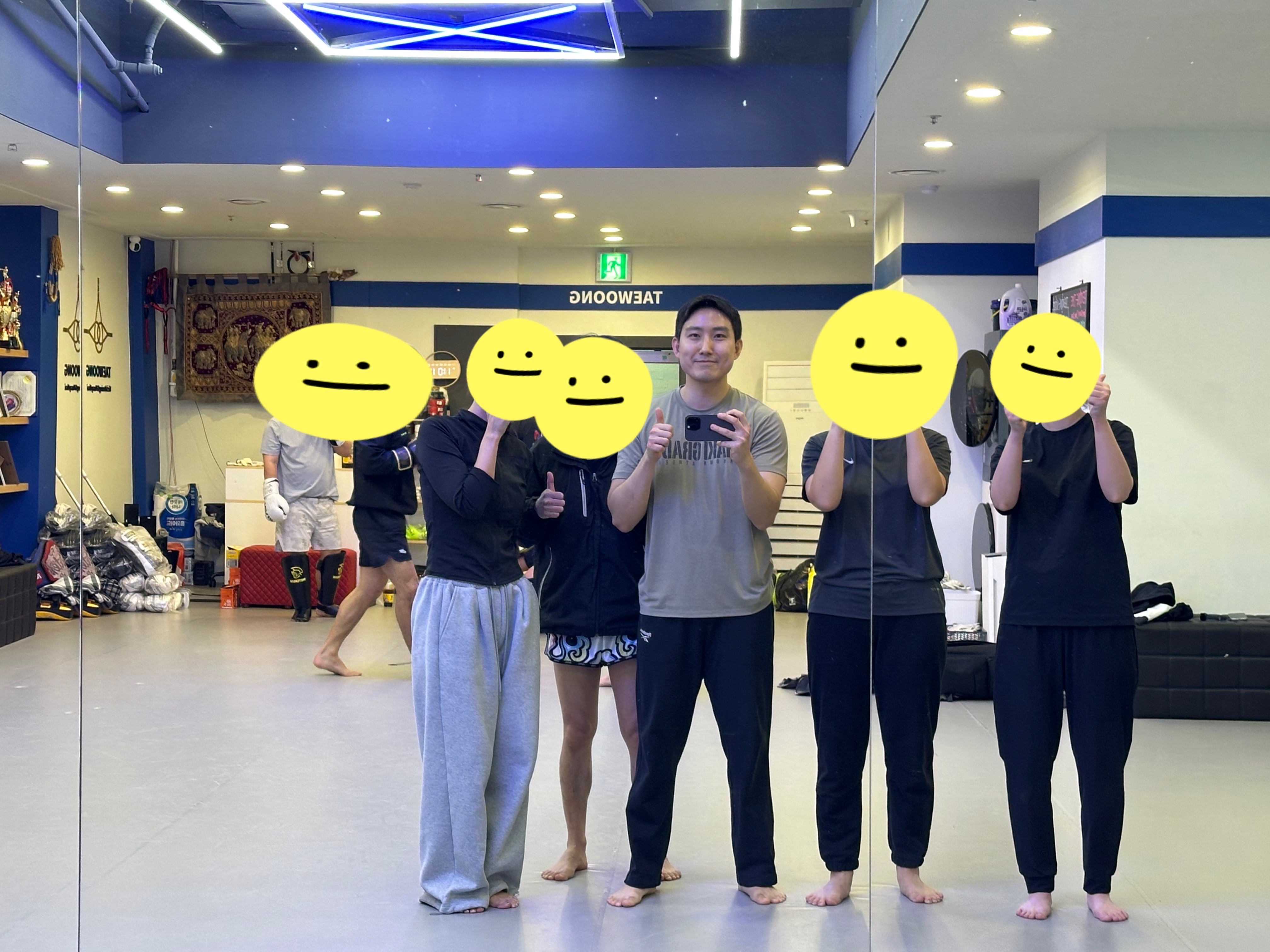 Group at the mirror in the gym